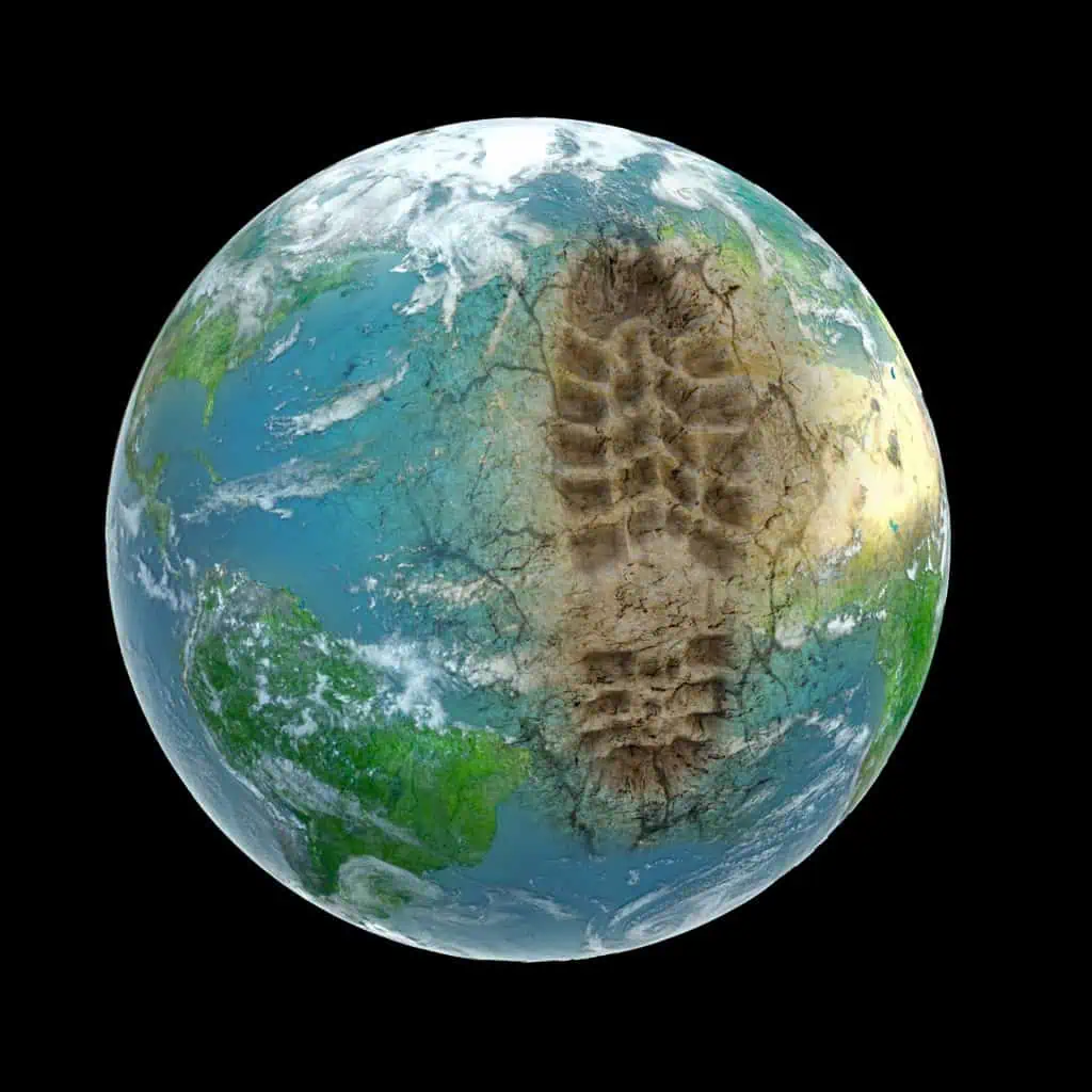 Planet Earth With Footprint | Carbon Footprint Reduction Strategies | RouteSavvy Route Planning Software